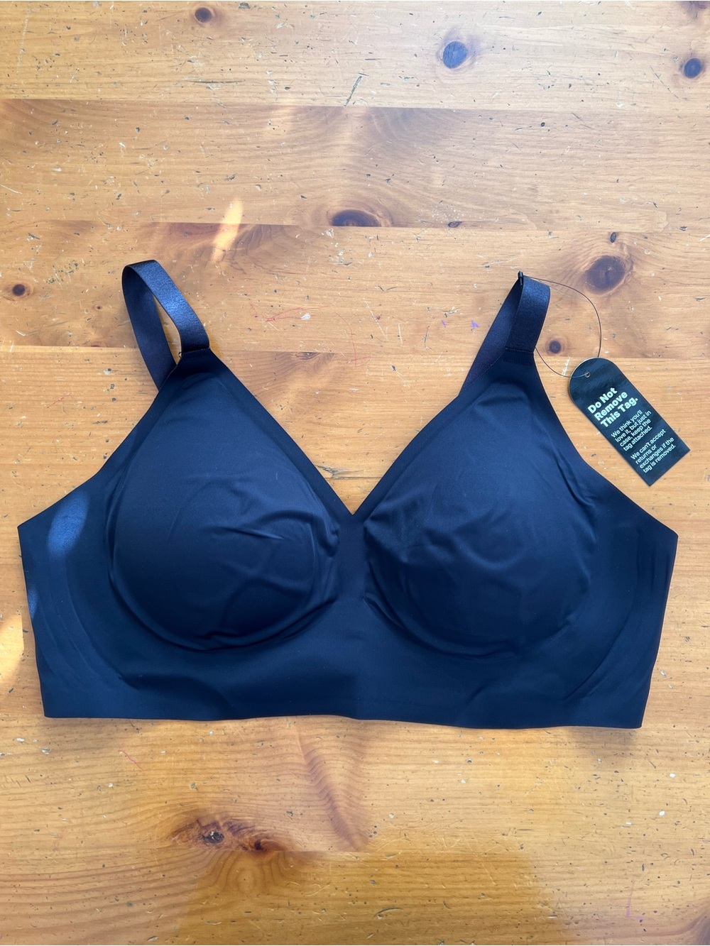 Two Eby Black and Tan Seamless Bras